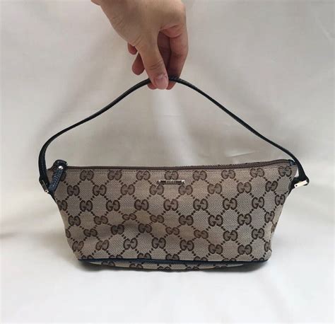 pochette gucci offerte|Gucci pochette vintage.